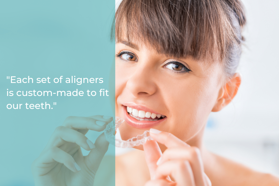 A woman smiles while holding a clear dental aligner, highlighting the benefits of custom-made Invisalign for straighter teeth.