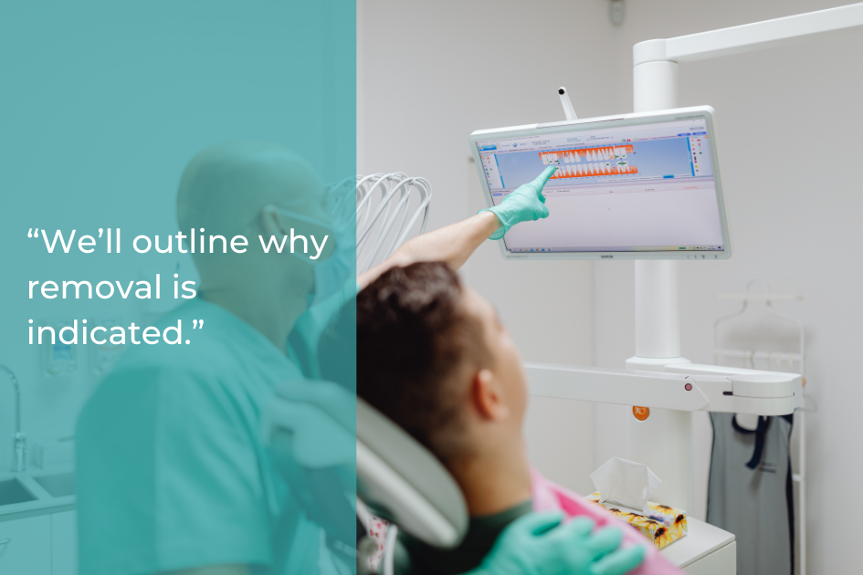 A dentist in gloves points to a dental X-ray on a monitor while a patient sits in the chair; text overlay reads, “We’ll outline what to expect during your tooth extraction.”.
