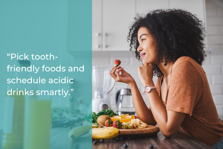 A woman sits at a kitchen counter holding a strawberry, with assorted fruits and a cutting board in front of her, next to a Dental Reset tip for a Healthy Smile displayed on the left.
